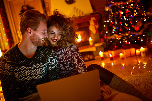 istock Young couple looking on laptop 618741716