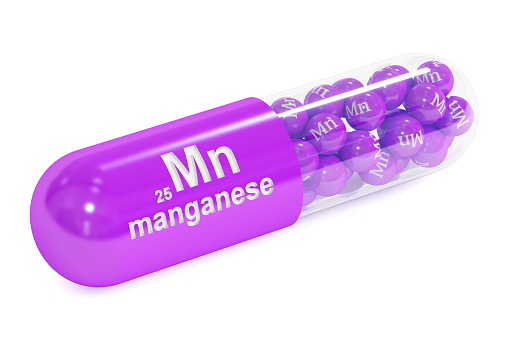 Capsule with manganese Mn element Dietary supplement, 3D rendering isolated on white background
