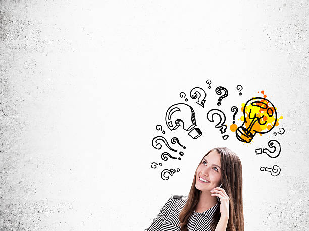 istock Girl with cellphone and question marks 618742360