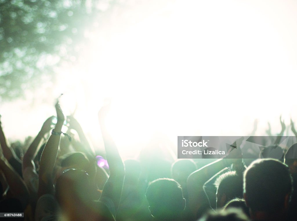 People at music party Music party-Many people dancing with music Standing Ovation Stock Photo