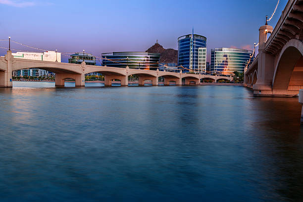 Tempe Arizona At Blue Hour Tempe Arizona photographed from the Salt River during blue hour. tempe arizona stock pictures, royalty-free photos & images