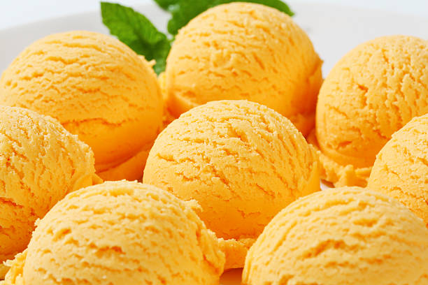 Scoops of apricot ice cream