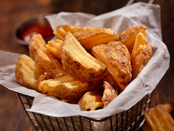 istock Basket of Wedge Fries 618748360