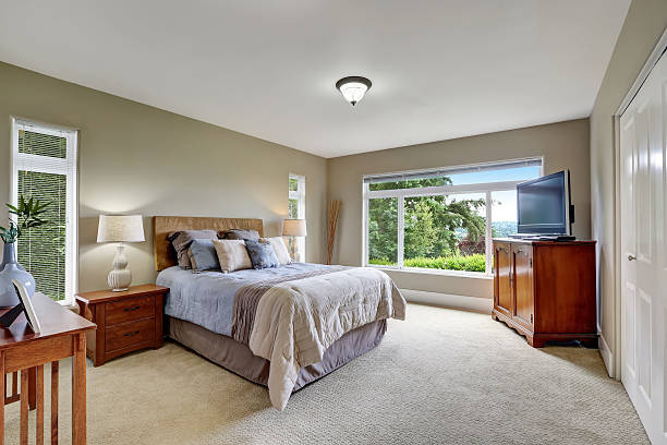 istock Elegant bedroom interior with soft blue bed 618748550