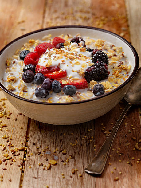 istock Hot 7 Grain Breakfast Cereal With Yogurt and Fresh Fruit 618748560