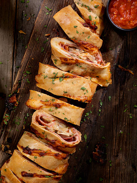 istock Stromboli with Pepperoni, Salami, Mushrooms and Peppers 618749440