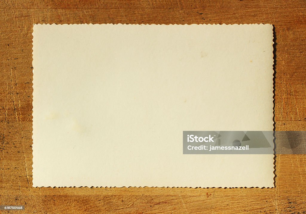 Old Paper on Wood Table (including clipping path) 1950-1959 Stock Photo