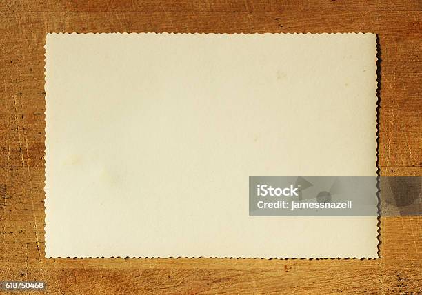 Old Paper On Wood Table Stock Photo - Download Image Now - 1950-1959, Photography, Picture Frame