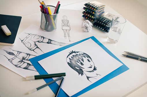 Process of creating manga drawings.