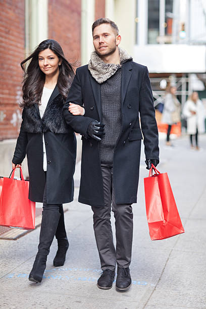 istock Fashionable couple going shopping 618752480