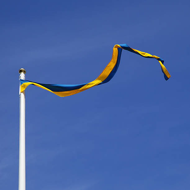 шведский флаг  - day sky swedish flag banner стоковые фото и изображения