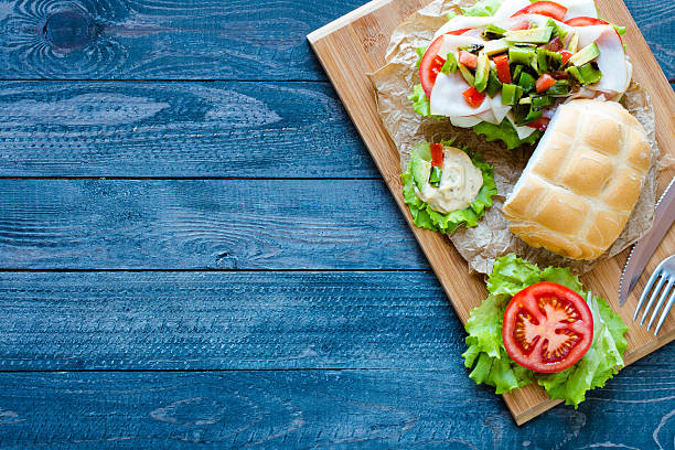 istock Fresh and tasty sandwich with ham and vegetables 618754102