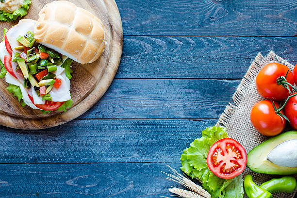 istock Fresh and tasty sandwich with ham and vegetables 618754294