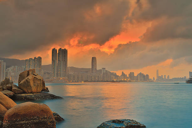 istock golden sunset at Victoria Harbour 618759390