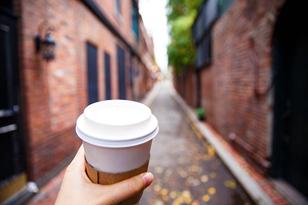 istock walking around town with coffee in hand 618761198