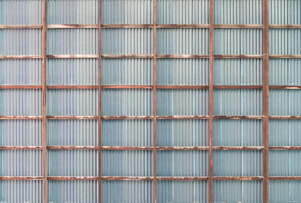 istock Wood frame ceiling with old rusty zinc roof, background 618761624