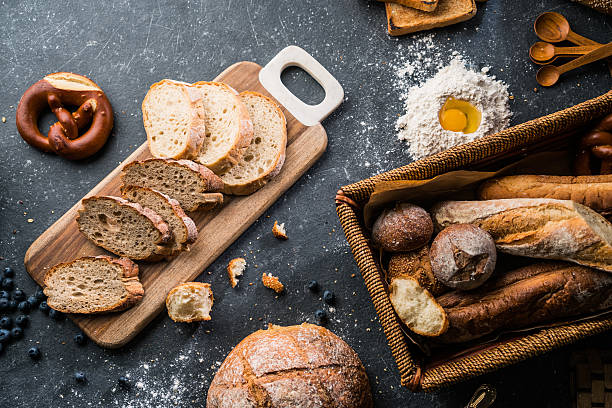 istock Freshly baked bread on wooden table 618761630