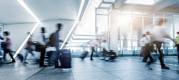 istock passengers walking in airport interior,shanghai. 618761686