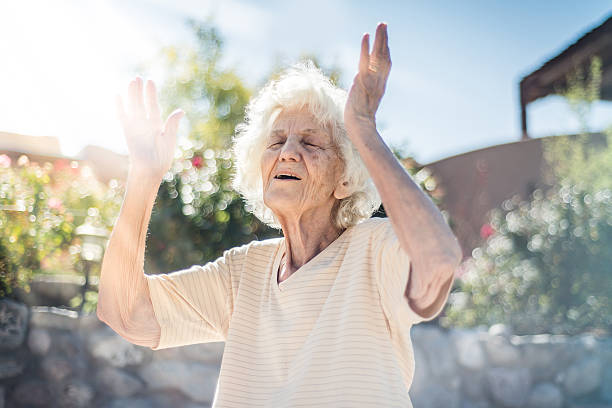 istock Senior woman talking and gesturing 618761722