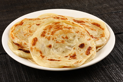 Famous Asian flat bread known as Parathas,served in plate.