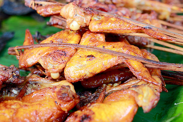 istock roasted chicken on banana leaf, Grilled chicken, 618765900