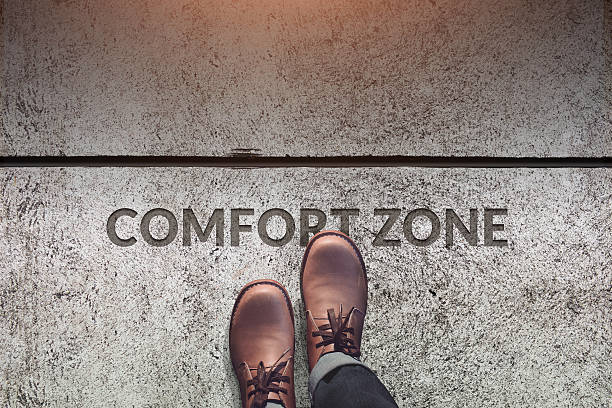 Comfort Zone Concept Shoe Steps on Concrete Floor, Top view stock photo