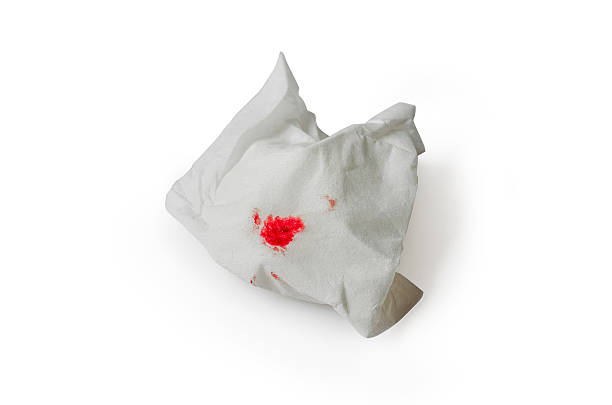 istock Blood drip on paper in white background 618830082