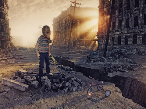 ruins of the city with and the boy  in the street. Photo combination  concept