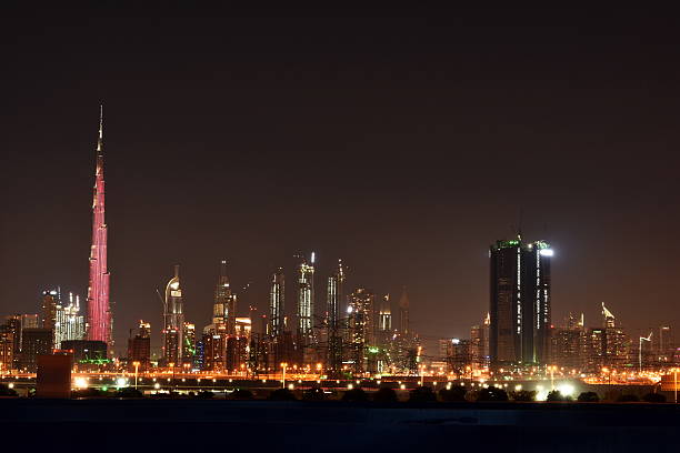 dubai city skyline   main road and new skyscrapers at sunset