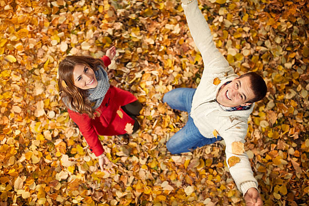 istock Top view of girlfriend with partner in park 618831482