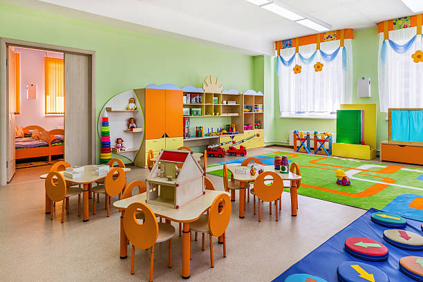 Kindergarten, game room. The interior of the new game room in the kindergarten. blue house red door stock pictures, royalty-free photos & images