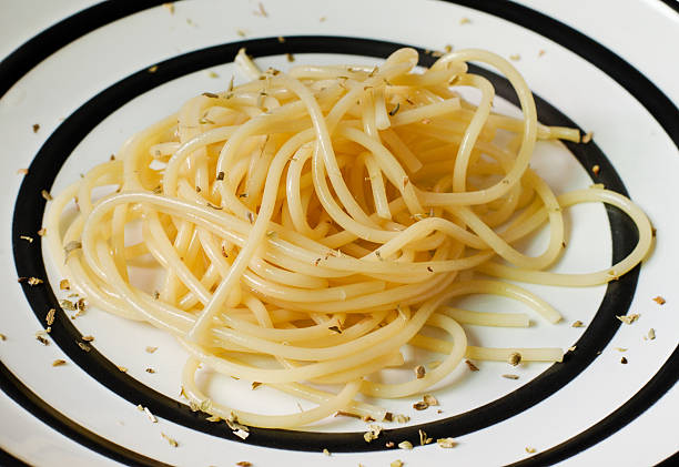 istock Spaghetti boiled until cooked in a dish, sprinkle with oregano. 618832838