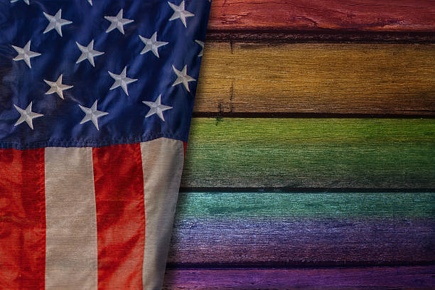 istock Rainbow Color on Wooden Plate with America Flag 618833228