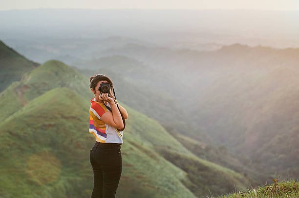 istock women photographer  outside 618833534