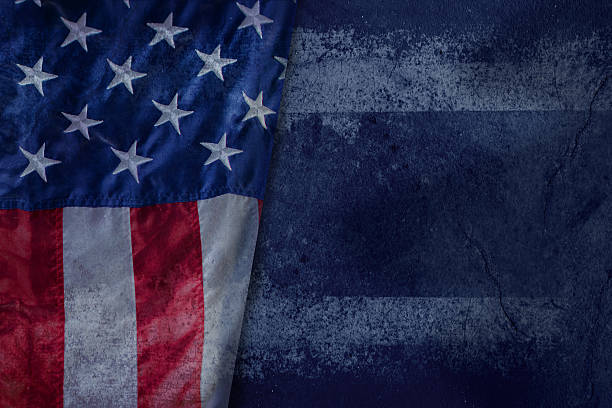 istock Vintage American flag on a Grunge Blue Cement background 618834920