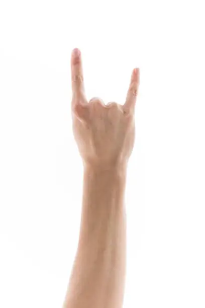 Hand making a rock / devil symbol.