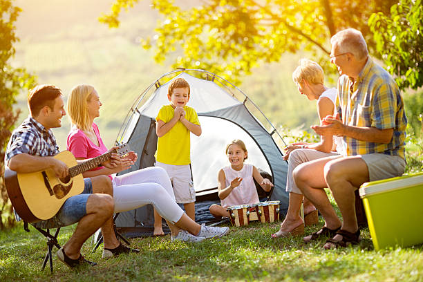 istock Generation family playing a guitar and singing 618837566