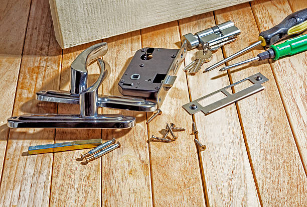 Tools and mortise lock before installing the door. Hand tools and mortise lock, topic Construction and repair. latch stock pictures, royalty-free photos & images