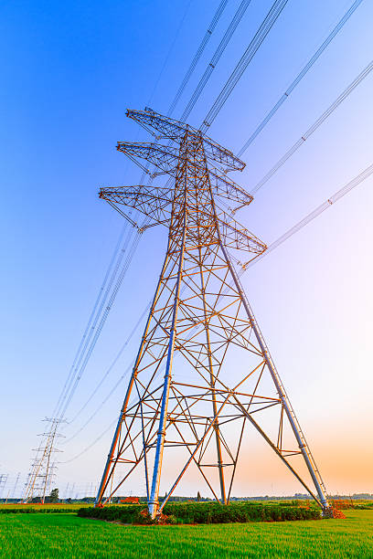 istock High voltage power tower scenery at dusk 618840640