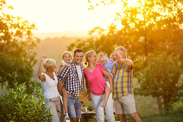 istock generation family on vacation posing together 618843090