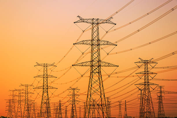 istock High voltage power tower scenery at dusk 618843290