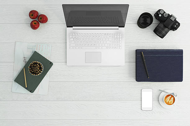 istock Top view of a table with a laptop 618844042