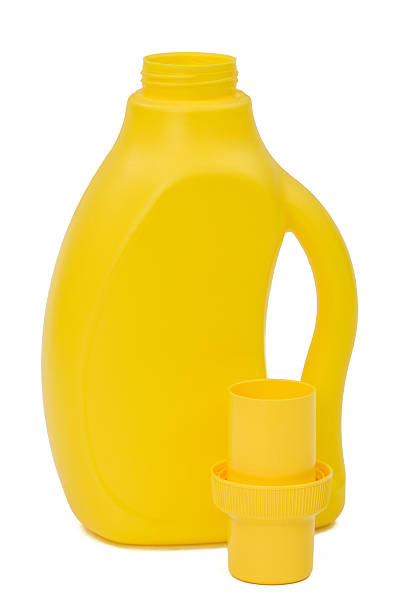 istock Yellow plastic bottle with a dispenser in cap 618844552