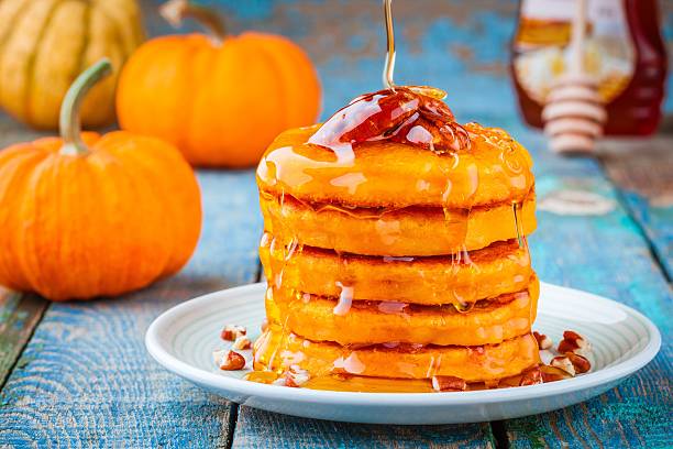 istock Pumpkin pancakes with honey and pecan 618846662