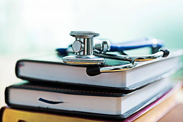 istock Medical stethoscope on books 618847300