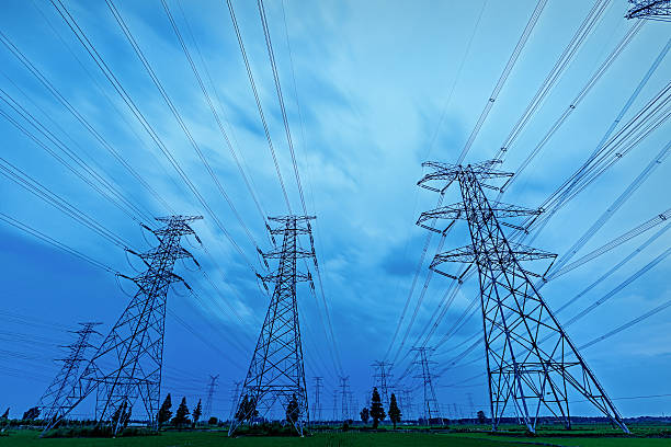 istock High voltage power tower scenery at dusk 618847396
