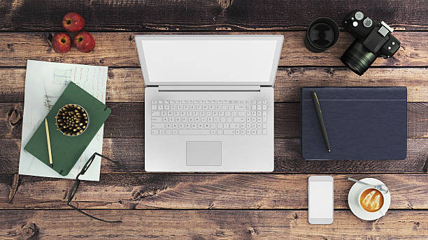 istock Top view of a table with a laptop 618849048