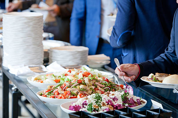 istock people at a banquet 618851102