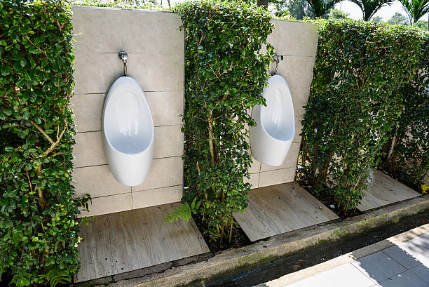 istock white urinals in outdoor restroom 618854874