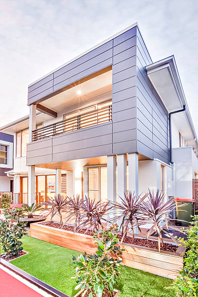 istock Modern house and garden lawn ground with blue sky 618855618